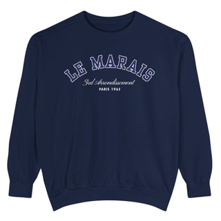 Navy blue sweatshirt with 'LE MARAIS' text on a white background