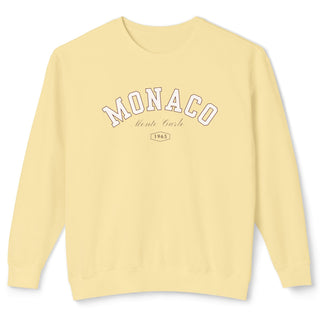 Light yellow sweatshirt with 'MONACO' text on a white background