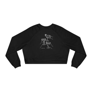 Black crop top with white graphic design on a white background