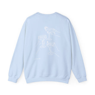 Light blue sweatshirt with a white graphic on the back against a white background