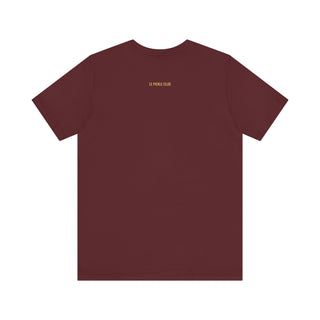 Maroon t-shirt with a small logo on the chest against a white background