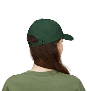 Person wearing a green cap and shirt on a white background