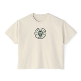 Beige t-shirt with a green logo on a white background