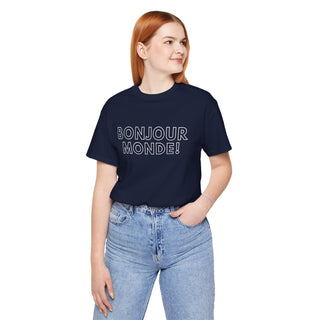 Person wearing a navy blue t-shirt with 'BONJOUR MONDE!' text on a white background