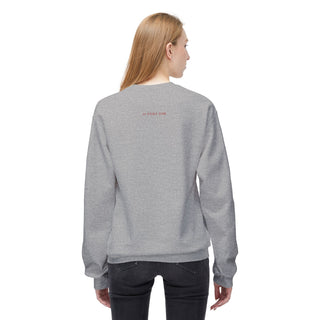 Girl wearing a gray sweatshirt with text on the back against a white background