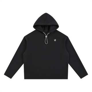 Black hoodie with a small logo on a white background