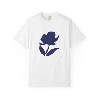 White t-shirt with a blue flower design on a white background
