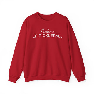 Red sweatshirt with 'j'adore LE PICKLEBALL' text on a white background