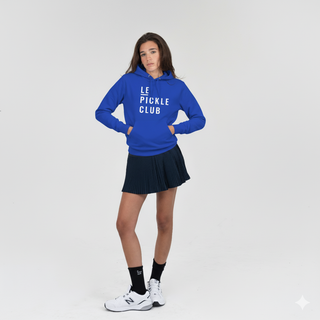Person wearing a blue hoodie with 'LE PICKLE CLUB' text on a white background