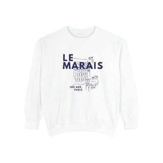 White sweatshirt with 'Le Marais' text and graphic on a white background