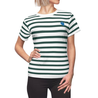 Person wearing a green and white striped t-shirt with a blue heart on a white background