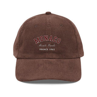 Brown cap with 'Monaco Monte Carlo France 1965' text on a white background