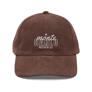 Brown cap with 'Monte Carlo Monaco' text on a white background