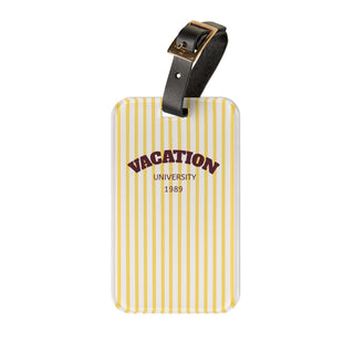 Luggage tag with yellow striped design and 'Vacation University 1989' text on a white background
