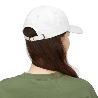Person wearing a white cap and green shirt on a white background